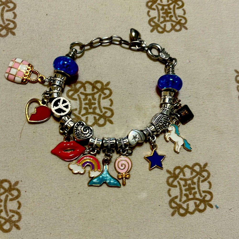 Charm bracelet gold and silver bracelet